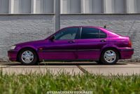 Honda Civic Sedan full wrap Teckwrap Passionate Purple en getinte ramen.